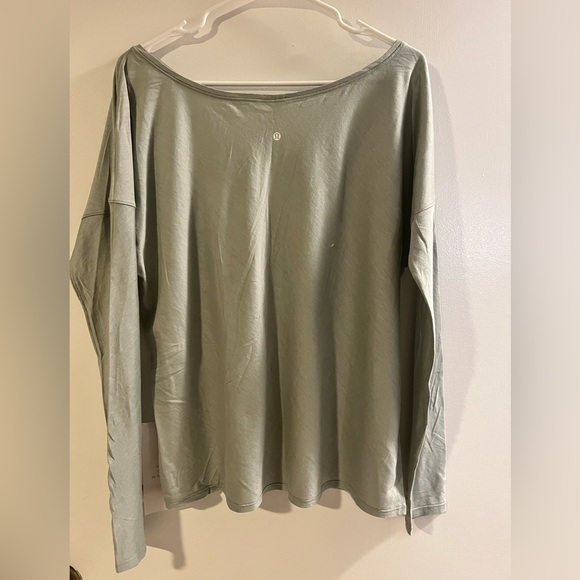 Never worn LuLuLemon Heart Open Long Sleeve. Size 10 - Picture 6 of 8